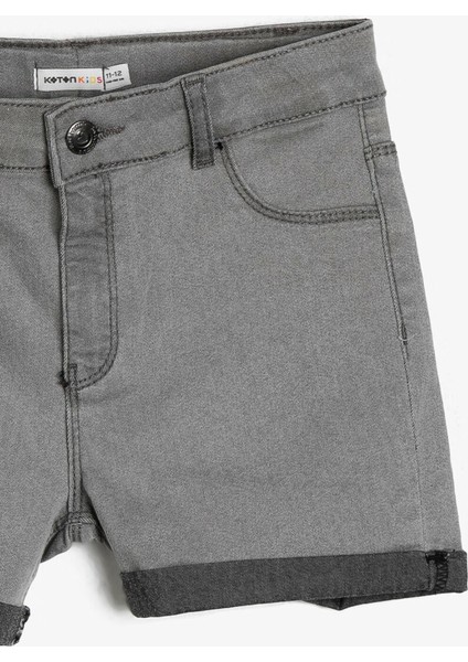 Esnek Jean Kumaştan Rahat Kesimli Paça Kıvırmalı Kısa Jean Şort