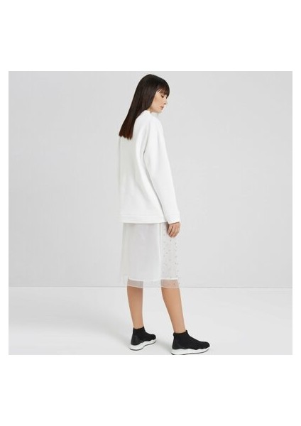 TÜL DETAYLI MİDİ ETEK modelleri