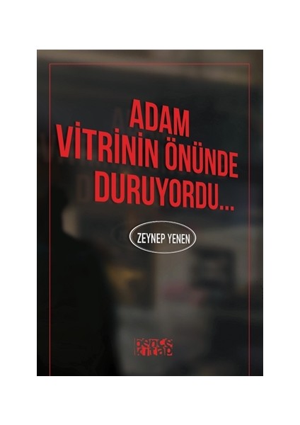 Adam Vitrinin Önünde Duruyordu