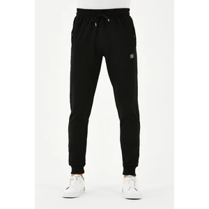 Erkek Eşofman Altı Dar Paça  Bel Kısmı Lastikli  Arka Cepli Paçası Lastikli  Fermuarlı Kompak Penye