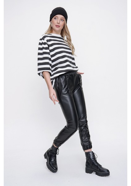 Kadın Siyah Çimalı Paçası Lastikli Deri Pantolon fiyatları