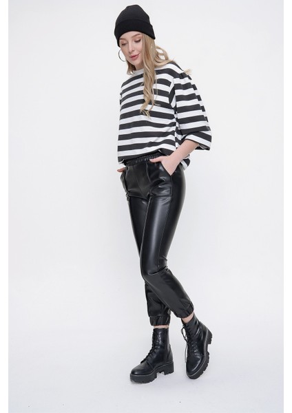 Kadın Siyah Çimalı Paçası Lastikli Deri Pantolon fırsatları