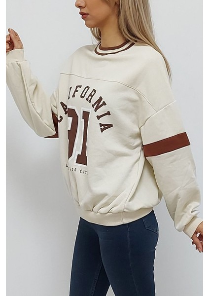 California Baskılı Kolej Yaka Oversize Içi Tüylü Sweatshirt Krem fırsatları