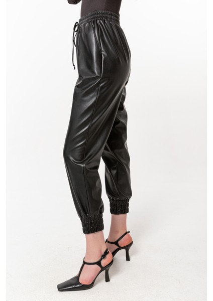 Beli Paçası Lastikli Deri Pantolon Siyah indirimleri