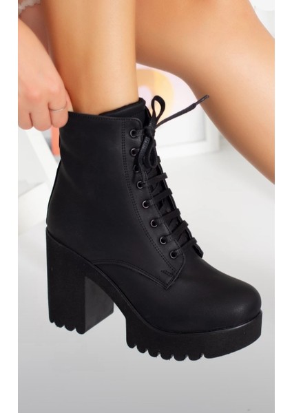 Siyah Cilt Deri Yüksek Kalın Topuklu Kadın Bot fiyatları