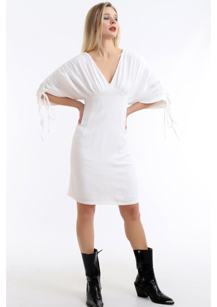 Özel Tasarım Ön Arka V Yaka Kol Büzgülü Rahat ve Şık Elbise fiyatları
