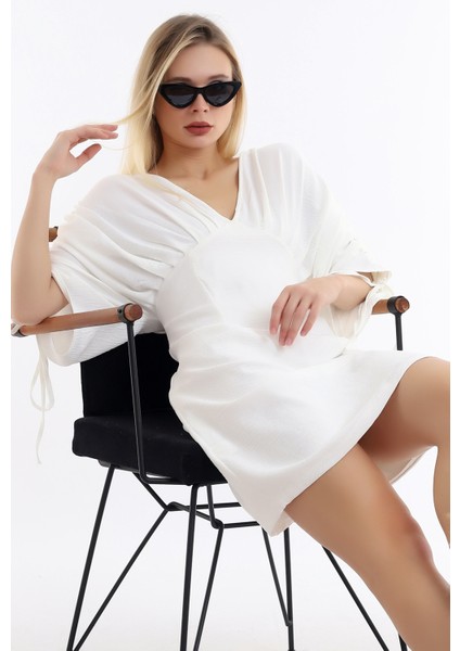 Özel Tasarım Ön Arka V Yaka Kol Büzgülü Rahat ve Şık Elbise modelleri