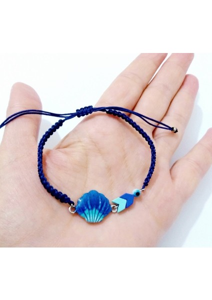 Mat Saks Mavisi ve Turkuaz Rengi Hematit Taşlı Nazar Boncuklu Midye Kabuğu Görünümlü Bileklik modelleri