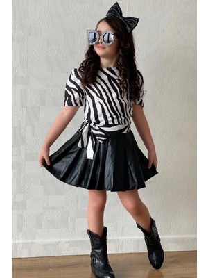 Kız Çocuk Zebra Desenli Şifon Bluzlu ve Taçlı Siyah Deri Etekli Takım
