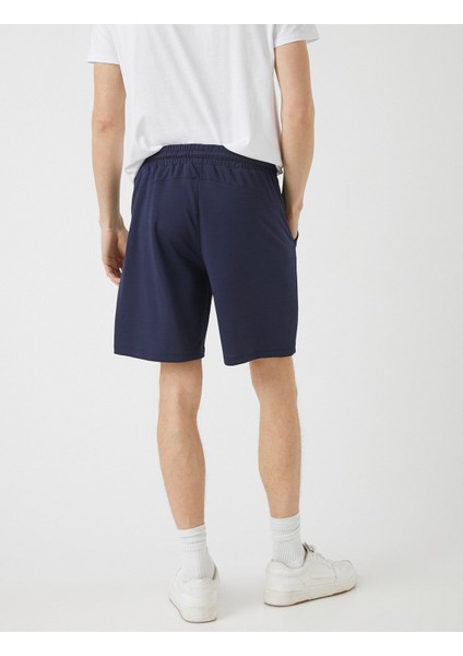 Erkek Baskılı Cepli Belden Bağlamalı Spor Şort fırsatları