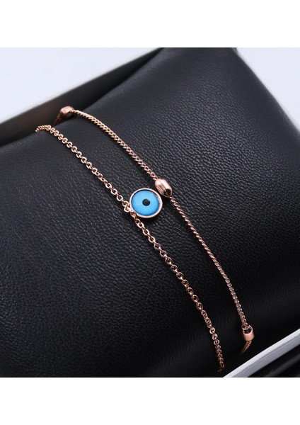 Rose Renk Taşlı Kadın Kol Saati & Rose Renk Nazar Boncuğu Bileklik Hediye Seti fiyatları