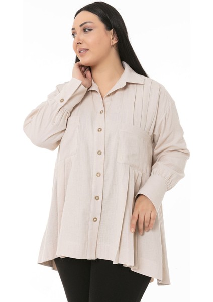 Büyük Beden Torba Cepli Önü ve Arkası Pileli Geniş Manşetli Arkası Uzun Bej Müslin Gömlek indirimleri