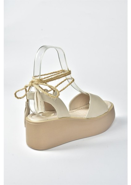 Ten Kalın Tabanlı Bilekten Bağlamalı Kadın Sandalet M996180409 indirimleri