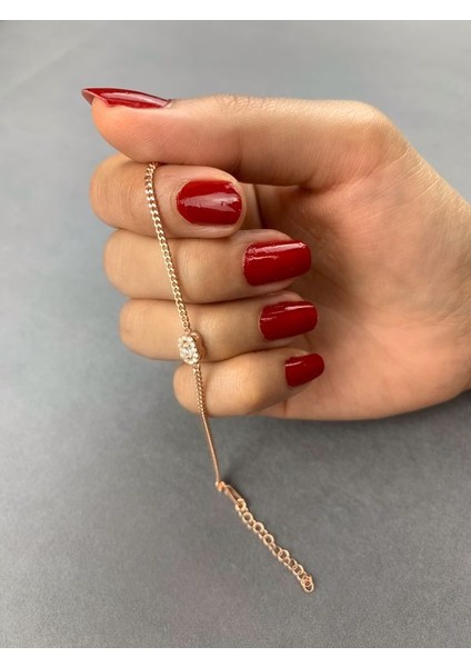 Oval Baget Taşlı Rose Kaplama Gümüş Kadın Bileklik