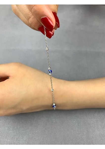 Dorika Toplu Rodyum Kaplama Koyu Mavi Nazarlıklı Gümüş Kadın Bileklik