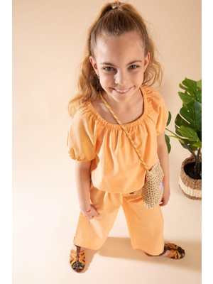 DeFacto Kız Çocuk Relax Fit Kısa Kollu Bluz Geniş Paça Pantolon Keten Görünümlü Takım X3235A622SM