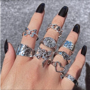 American Vintage Kadın 9'lu Şık Yüzük Seti – Günlük ve Özel Günlerde Zarif Takı Kombinleri İçin