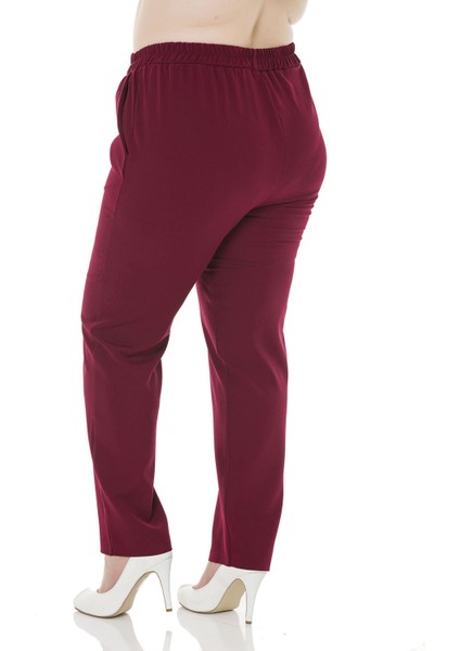 Büyük Beden Beli Yan ve Arkadan Lastikli Dar Paça Cepli Bordo Pantolon modelleri