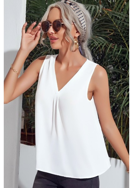 V Yaka Kolsuz Göğüs Kat Detaylı Standart Rahat Kesim Şık ve Cool Bluz modelleri