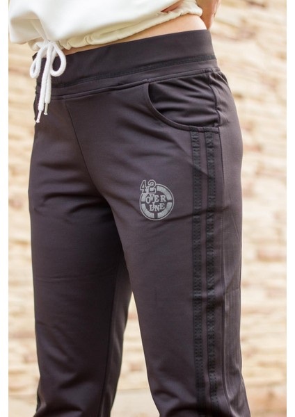 Kadın Siyah Şeritli Basic Esnek Rahat Kalıp Cepli Ince Eşofman Altı 21KESAAKT2 fırsatları