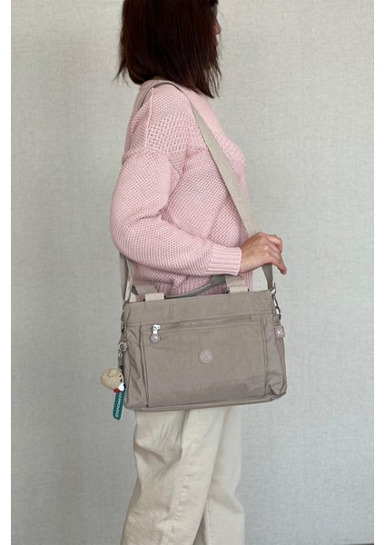 Kadın Çapraz Askılı Omuz Çantası Çok Cepli Ayarlanabilir 33X23CM + Anahtarlık Hediyeli modelleri