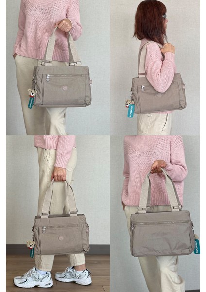 Kadın Çapraz Askılı Omuz Çantası Çok Cepli Ayarlanabilir 33X23CM + Anahtarlık Hediyeli indirimleri