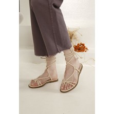 Ccway Kadın İpli Parmak Arası Sandalet Krem Renk %100 PU Deri Malzeme ile Şık Tasarım