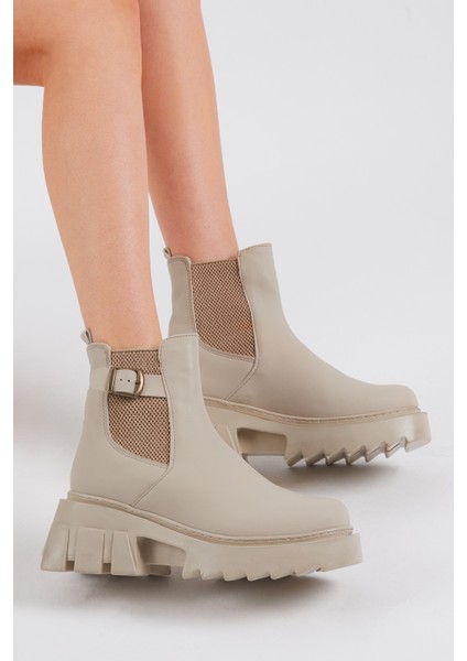 Kadın Krem Cilt Lastikli Bot Kaymaz Taban ve Rahat Kalıp Özellikleriyle modelleri