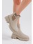 Kadın Krem Cilt Lastikli Bot Kaymaz Taban ve Rahat Kalıp Özellikleriyle 1