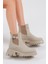 Kadın Krem Cilt Lastikli Bot Kaymaz Taban ve Rahat Kalıp Özellikleriyle 3