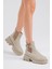 Kadın Krem Cilt Lastikli Bot Kaymaz Taban ve Rahat Kalıp Özellikleriyle 4