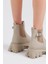 Kadın Krem Cilt Lastikli Bot Kaymaz Taban ve Rahat Kalıp Özellikleriyle 5