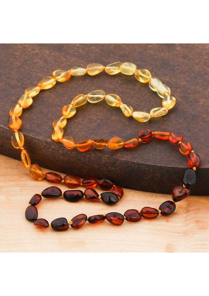 Bebek Damla Kehribar Diş Kolye modelleri