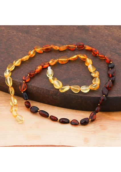 Bebek Damla Kehribar Diş Kolye fırsatları