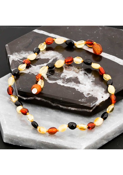 Bebek Damla Kehribar Diş Kolye modelleri