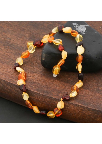 Bebek Damla Kehribar Diş Kolye modelleri