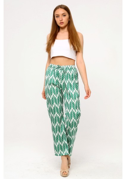 Yaprak Desenli Beli Lastikli ve Ip Detaylı Boru Paça Baskılı Saten Yeşil Kadın Pantolon fırsatları