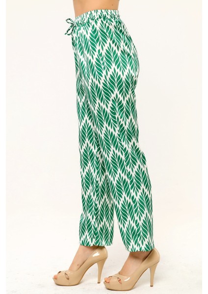 Yaprak Desenli Beli Lastikli ve Ip Detaylı Boru Paça Baskılı Saten Yeşil Kadın Pantolon indirimleri