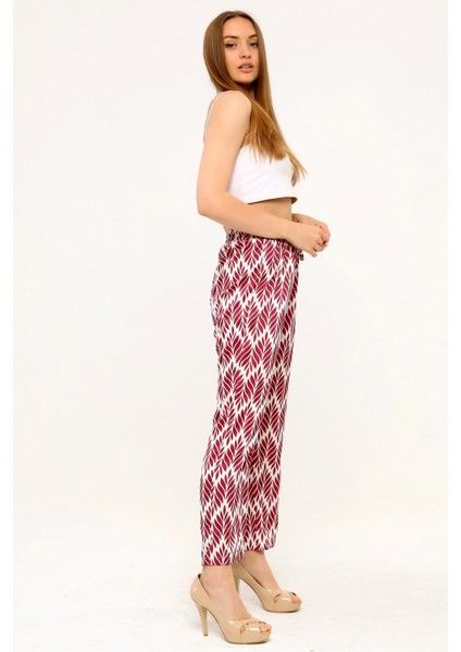 Yaprak Desenli Beli Lastikli ve Ip Detaylı Boru Paça Baskılı Saten Bordo Kadın Pantolon fırsatları