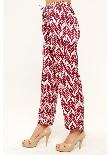 Yaprak Desenli Beli Lastikli ve Ip Detaylı Boru Paça Baskılı Saten Bordo Kadın Pantolon indirimleri
