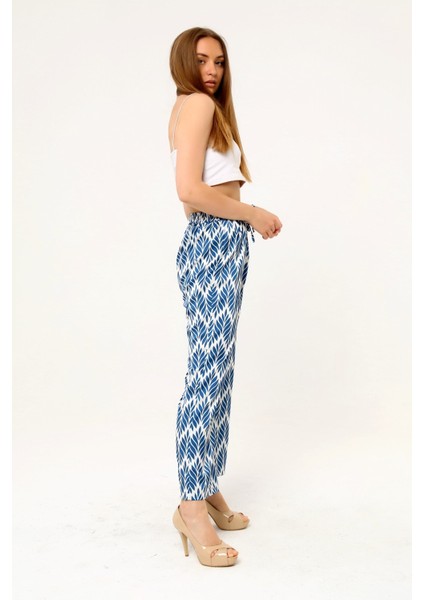 Yaprak Desenli Beli Lastikli ve Ip Detaylı Boru Paça Baskılı Saten Indigo Kadın Pantolon fırsatları