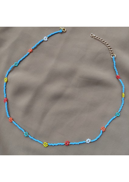 Papatya Detaylı Mavi-Renkli Kum Boncuk Kolye
