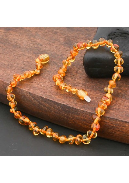 Bebek Damla Kehribar Diş Kolye fırsatları