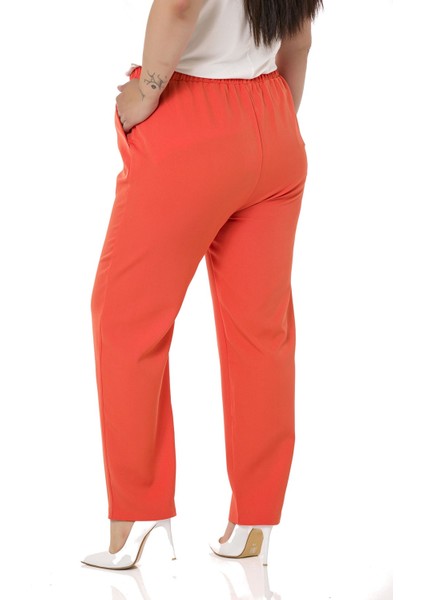 Büyük Beden Beli Yan ve Arkadan Lastikli Dar Paça Cepli Turuncu Pantolon modelleri