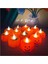 12 Adet Halloween Işıklı Gülen Yüz Balkabağı ve Örümcek Ağı Temalı Pilli LED Dekor Mumu Işığı 1