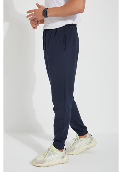 Erkek 3 Iplik Cepli Beli ve Paçası Lastikli Düz Eşofman Altı modelleri