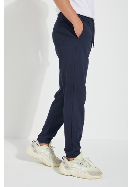 Erkek 3 Iplik Cepli Beli ve Paçası Lastikli Düz Eşofman Altı fırsatları