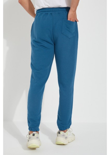 Erkek 3 Iplik Cepli Beli ve Paçası Lastikli Düz Eşofman Altı modelleri