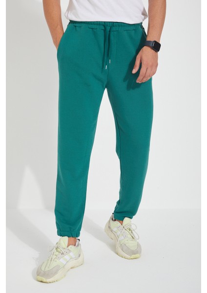 Erkek 3 Iplik Cepli Beli ve Paçası Lastikli Düz Eşofman Altı modelleri