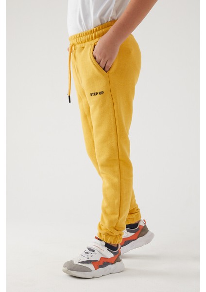 Erkek Çocuk 3 Iplik Cepli Beli ve Paçası Lastikli Baskılı Eşofman Altı modelleri